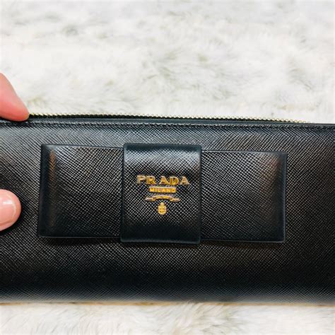 prada bow zip around wallet|prada zippy wallet.